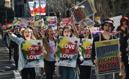 Supporters of same-sex marriage shout slogans as they take part in a rally in Sydney on August 9, 2015. Thousands of people rallied in Australian cities this weekend in support of same-sex marriage, as politicans across multiple parties prepared to table a bill to make the unions a legal right. AFP PHOTO / Peter PARKS        (Photo credit should read PETER PARKS/AFP/Getty Images)
