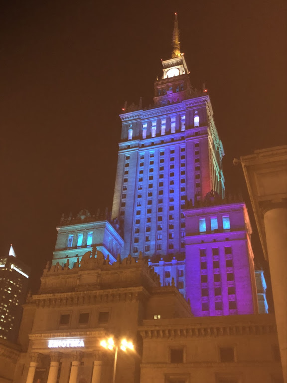 Palace of Culture and Science in Warsaw, lit in rainbow colors
