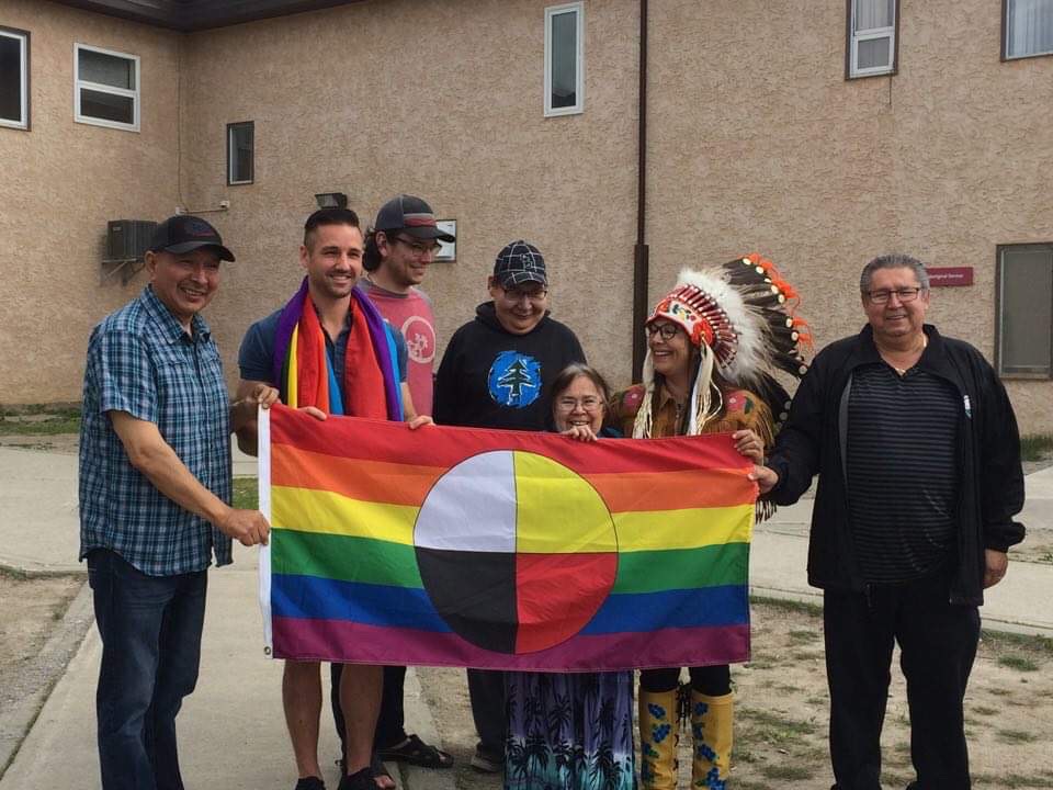 The Indigenous Pride Flag includes Cheif of the Lac La Ronge Indian Band Tammy Cook Searson, Colin's fellow council member Jordan McPhail, Provincial MLA Doyle Vermette. © Colin Ratushniak