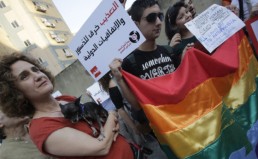 Lebanese homosexuals, human rights activists and members from the NGO Helem (the Arabic acronym of "Lebanese Protection for Lesbians, Gays, Bisexuals and Transgenders") attend an anti-homophobia rally in Beirut on April 30, 2013 to condemn the arrest on the weekend of three gay men and one transgender civilian in the town of Dekwaneh east of Beirut at a nightclub who were allegedly verbally and sexually harassed at the municipality headquarters. AFP PHOTO/JOSEPH EID        (Photo credit should read JOSEPH EID/AFP/Getty Images)