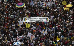 Sao Paulo just hosted the world’s biggest Pride Revelers protest against Brazilian interim President Michel Temer during the 20th Gay Pride Parade, whose theme is "Gender identity law, NOW! Everyone together against transphobia!",in Sao Paulo, Brazil on May 29, 2016. / AFP / Miguel Schincariol (Photo credit should read MIGUEL SCHINCARIOL/AFP/Getty Images)